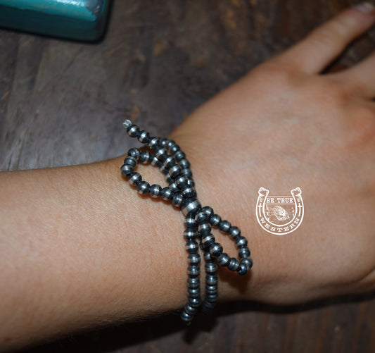 The Navajo Pearl Bow Bracelet (Multiple Colors)