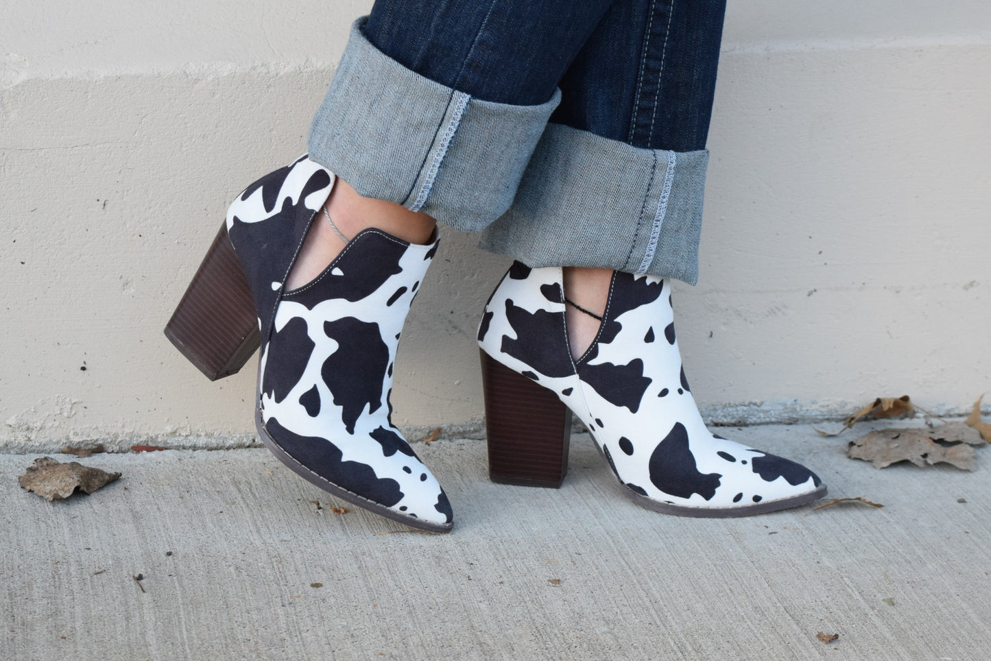The Calloway Cowprint Booties