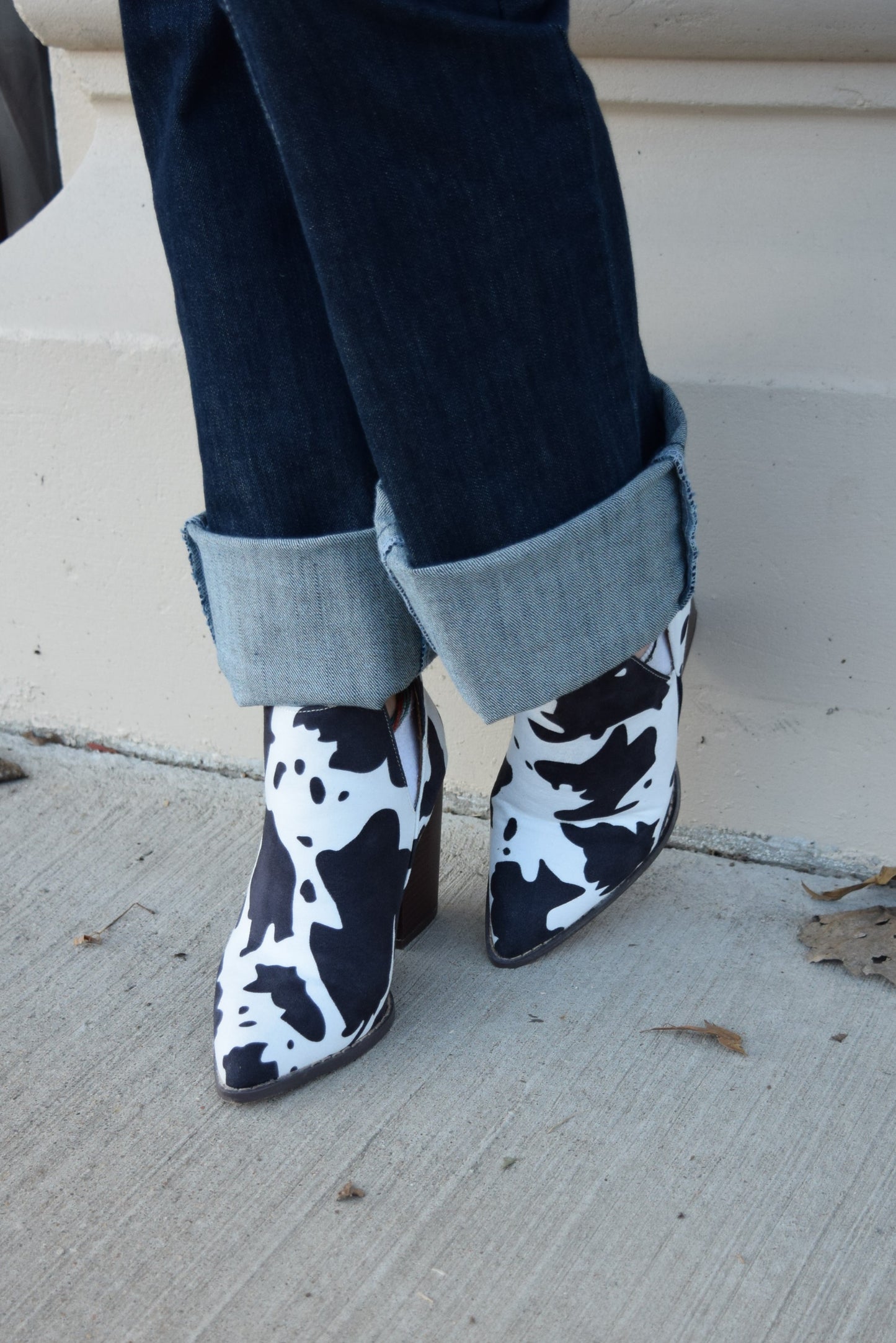 The Calloway Cowprint Booties