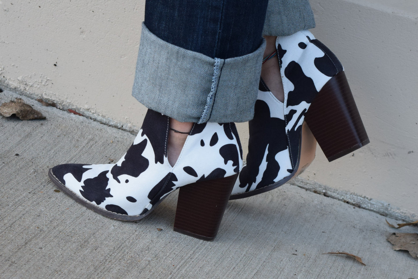 The Calloway Cowprint Booties