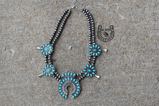 The Turquoise Squashed Blossom Necklace